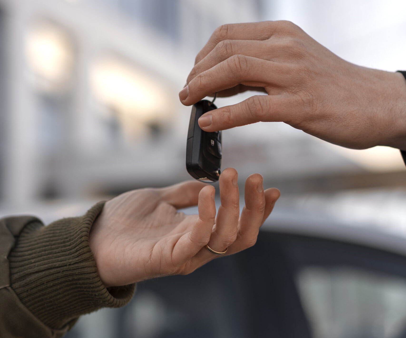 House energy efficiency or energy saving rate for reduce carbon footprint. Hand hold light bulb with energy efficient rating class concept to save cost green energy.